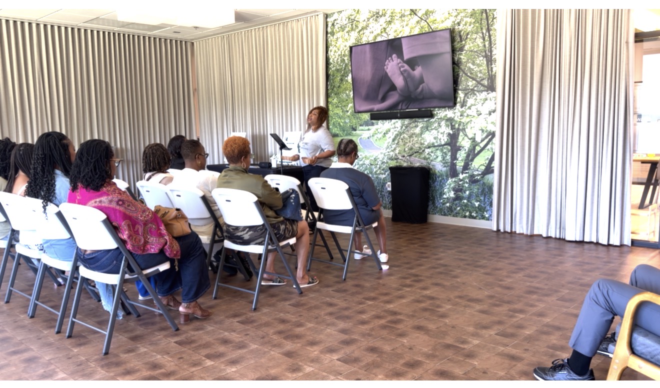 Attendees listening during a mindfulness session